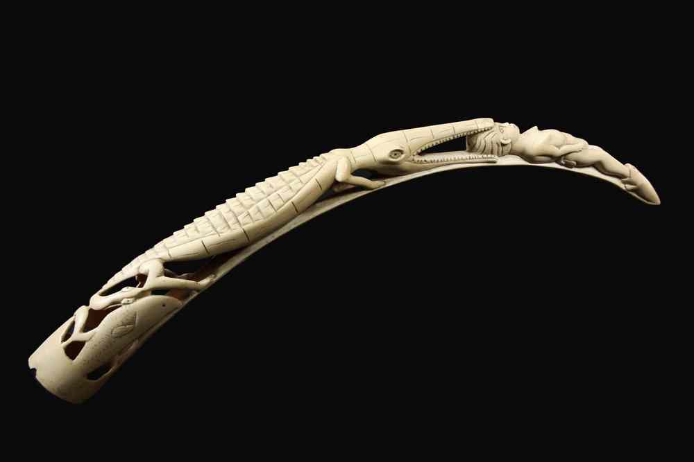 Appraisal: CARVED ELEPHANT TUSK - Late th c African Creation Myth