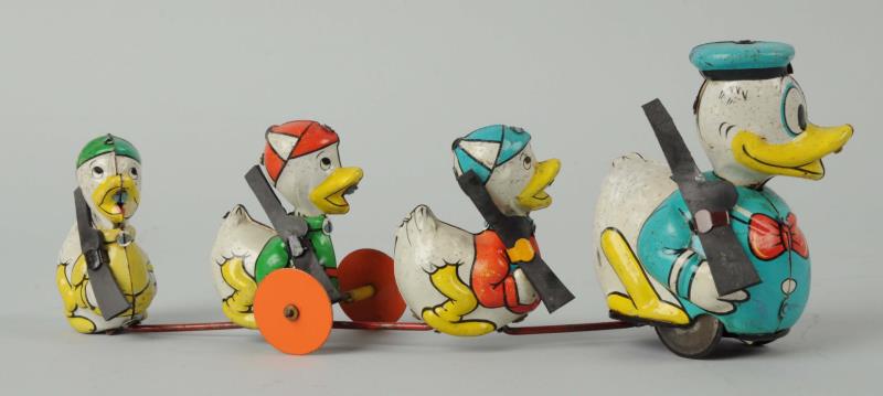 Appraisal: Marx Donald Duck Nephews Wind-up Toy This Marx Donald Duck