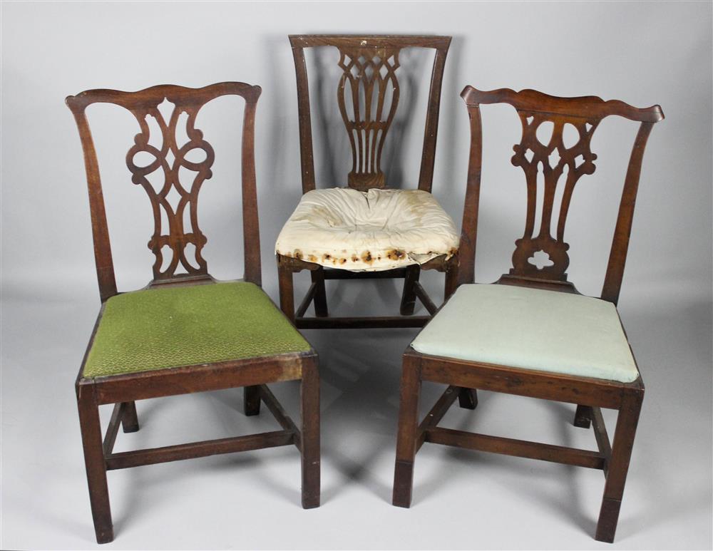 Appraisal: THREE CHIPPENDALE STYLE SIDE CHAIRS the first having a shaped