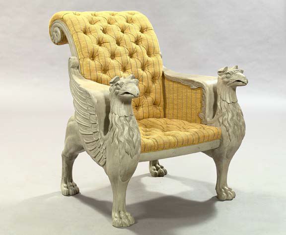 Appraisal: Monumental Carved and Polychromed Winged Griffin Armchair the side and