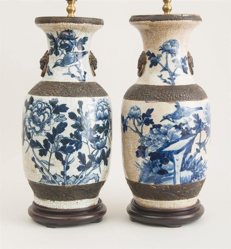 Appraisal: PAIR OF CHINESE CRACKLE GLAZED PORCELAIN LAMPS Each baluster-shaped urn