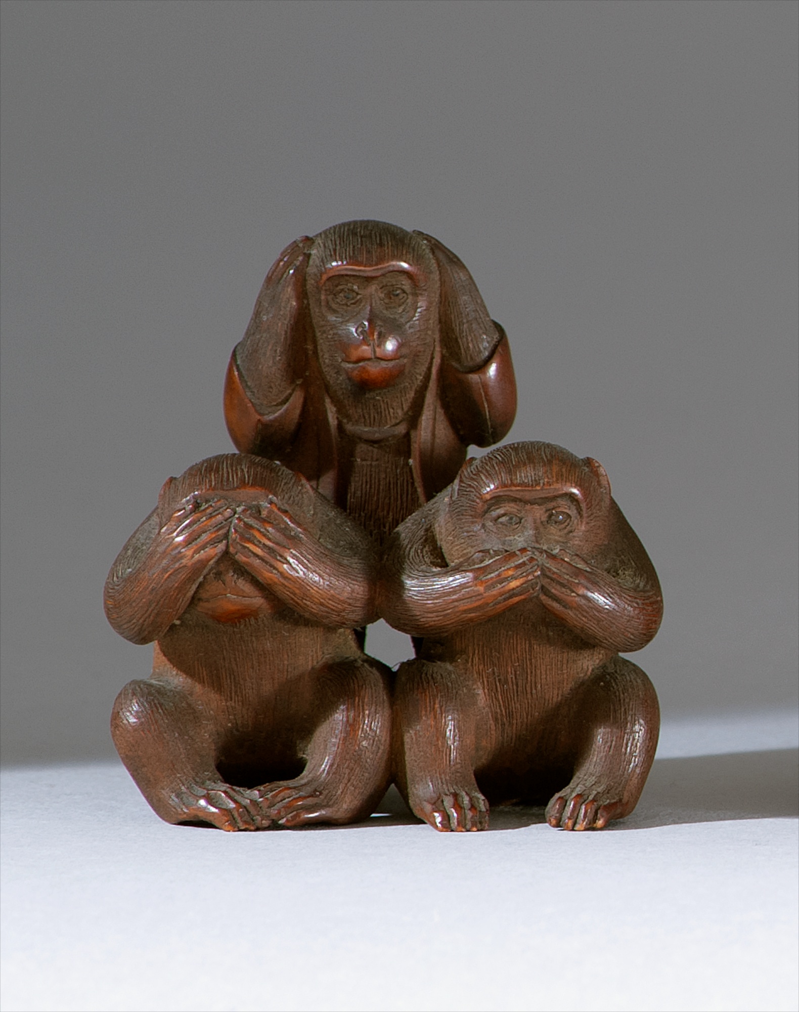 Appraisal: WOOD NETSUKE OKIMONO th CenturyBy Unhodo Masayoshi Depicting the three