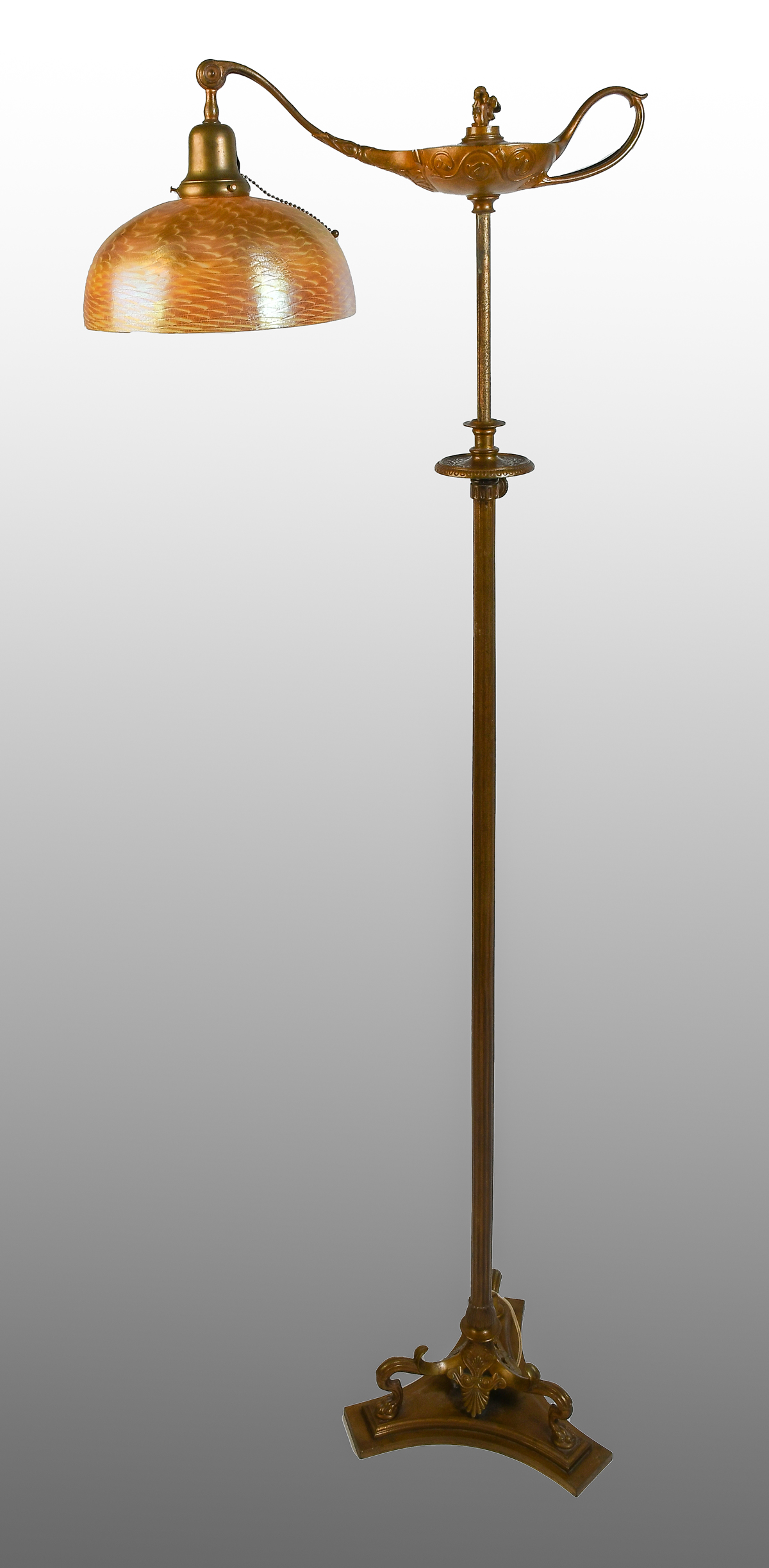 Appraisal: TIFFANY ''ALADDIN'' FLOOR LAMP SHADE Bronze adjustable lamp base surmounted