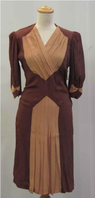 Appraisal: Dinner dress in brown and caramel toned brown crepe some