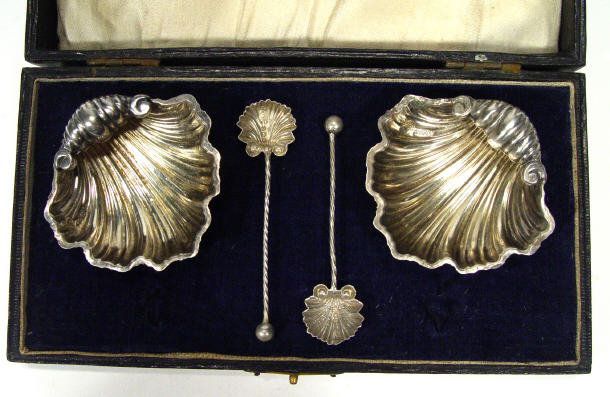 Appraisal: Pair of silver shell shaped salts with matching spoons in