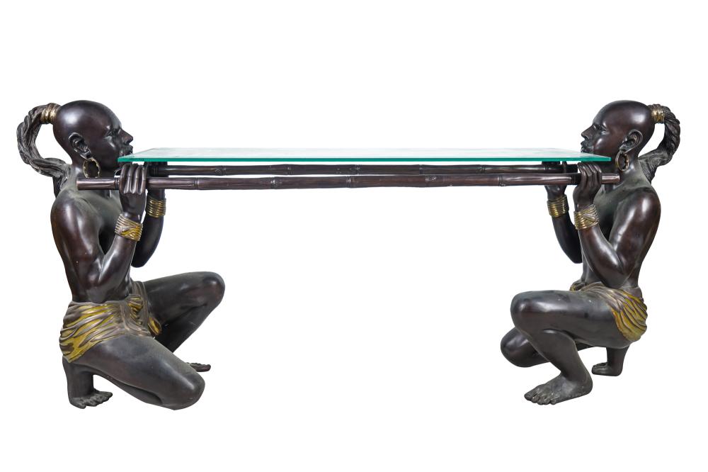 Appraisal: PATINATED METAL FIGURAL SOFA TABLEdepicting two figures holding a glass