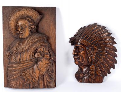 Appraisal: A carved wood panel of a cavalier cm x cm