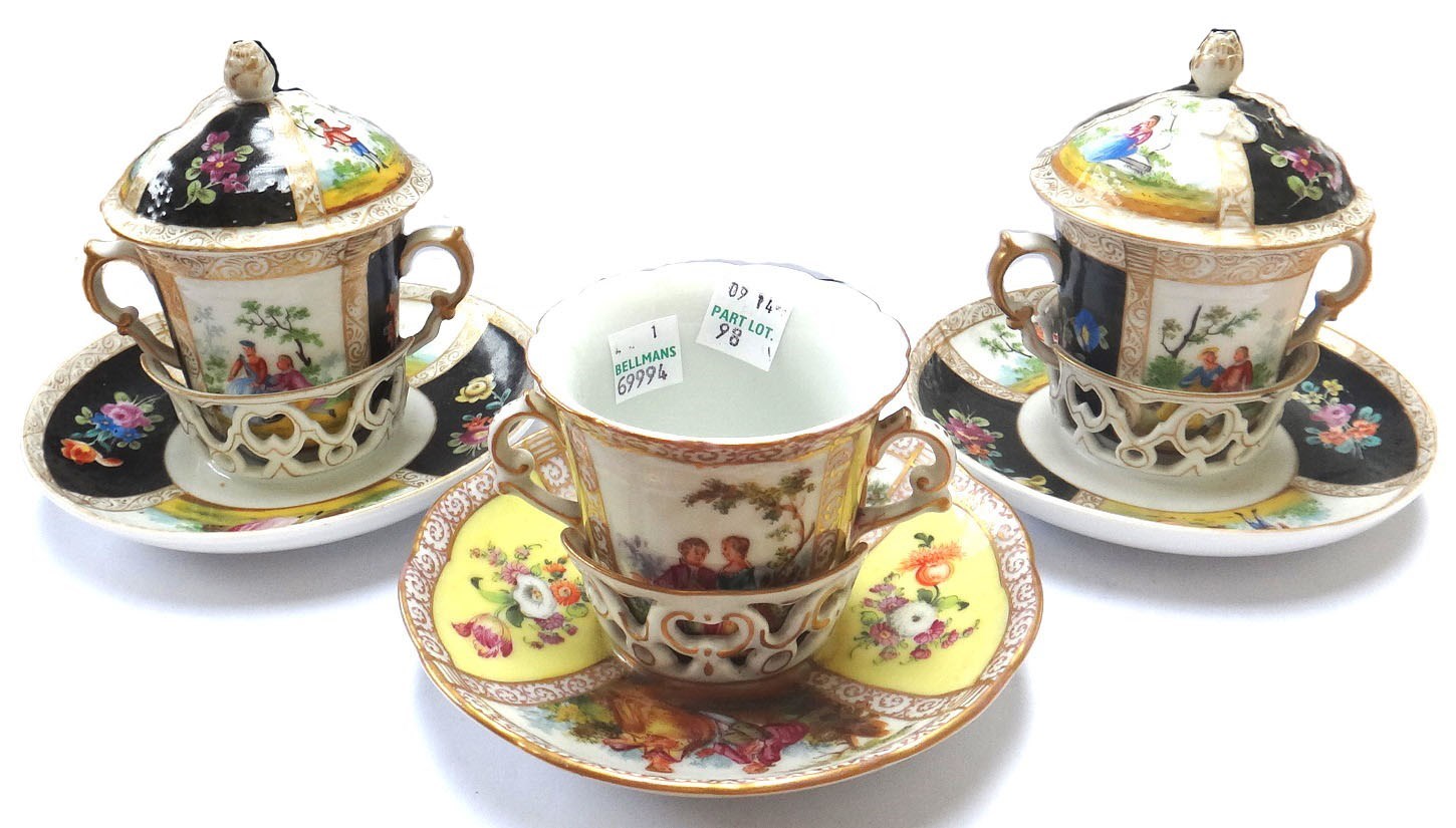 Appraisal: A pair of Dresden chocolate cups covers and stands late