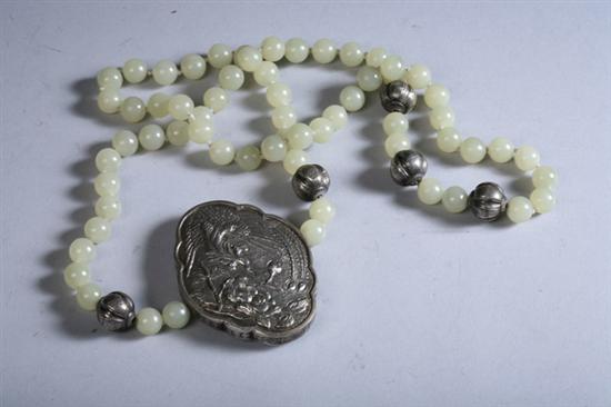 Appraisal: A CHINESE SILVER AND JADE NECKLACE - in long