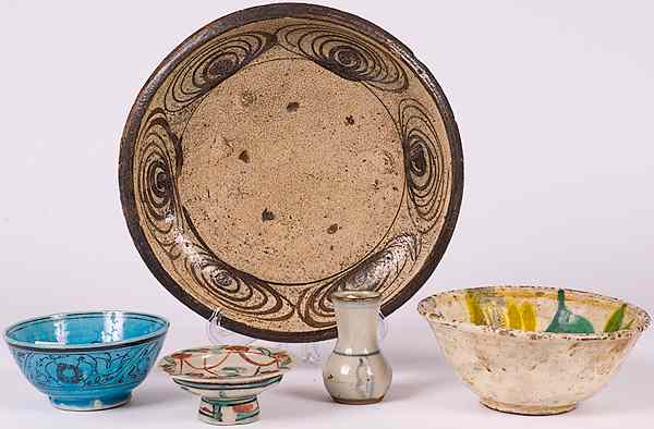 Appraisal: Persian Pottery Persian an assembled group of five pieces including