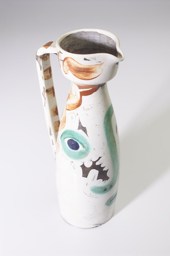 Appraisal: PICASSO MADOURA White clay pitcher painted with a face in