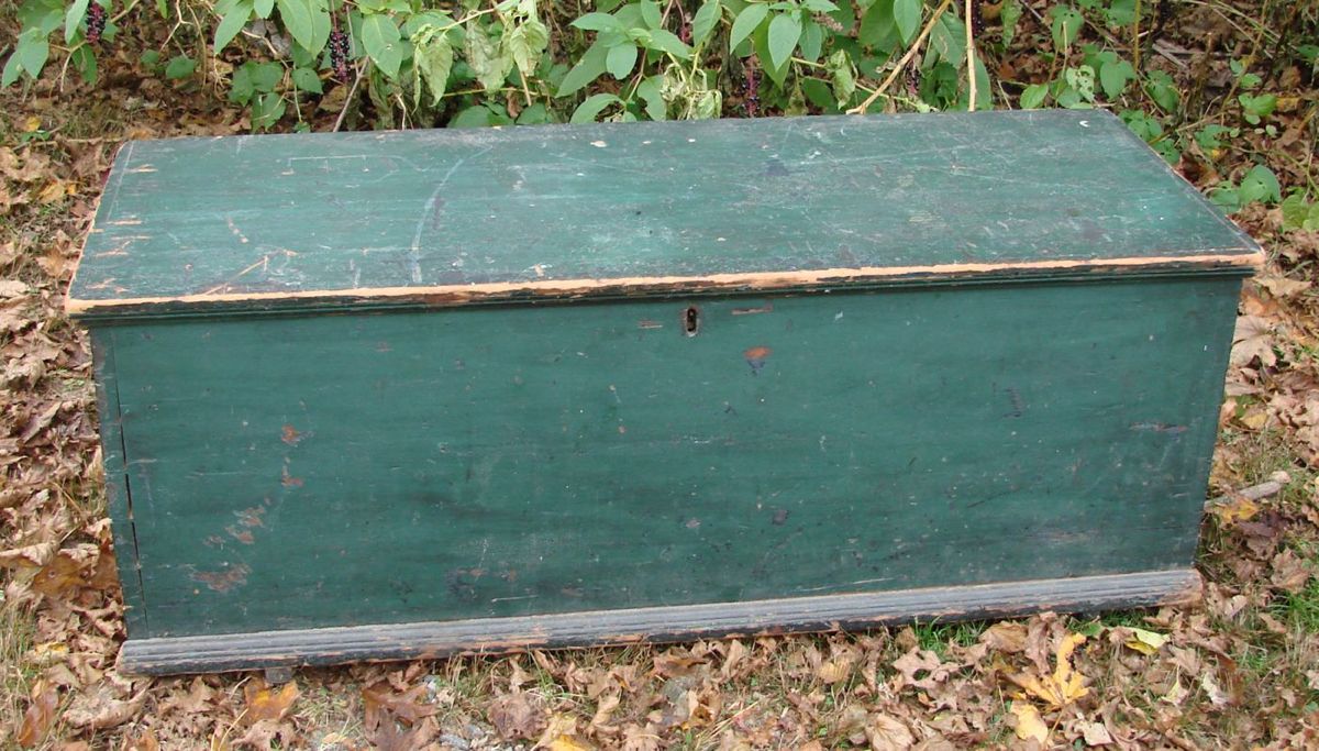 Appraisal: ANTIQUE SIX-BOARD LIFT-TOP CHEST In pine with green paint Interior