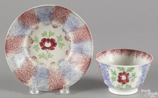 Appraisal: Red and blue rainbow spatter cup and saucer with Adam's