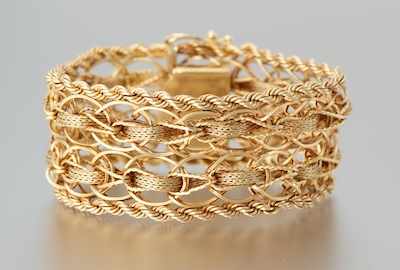 Appraisal: A Ladies' k Gold Strap Bracelet k yellow gold bracelet