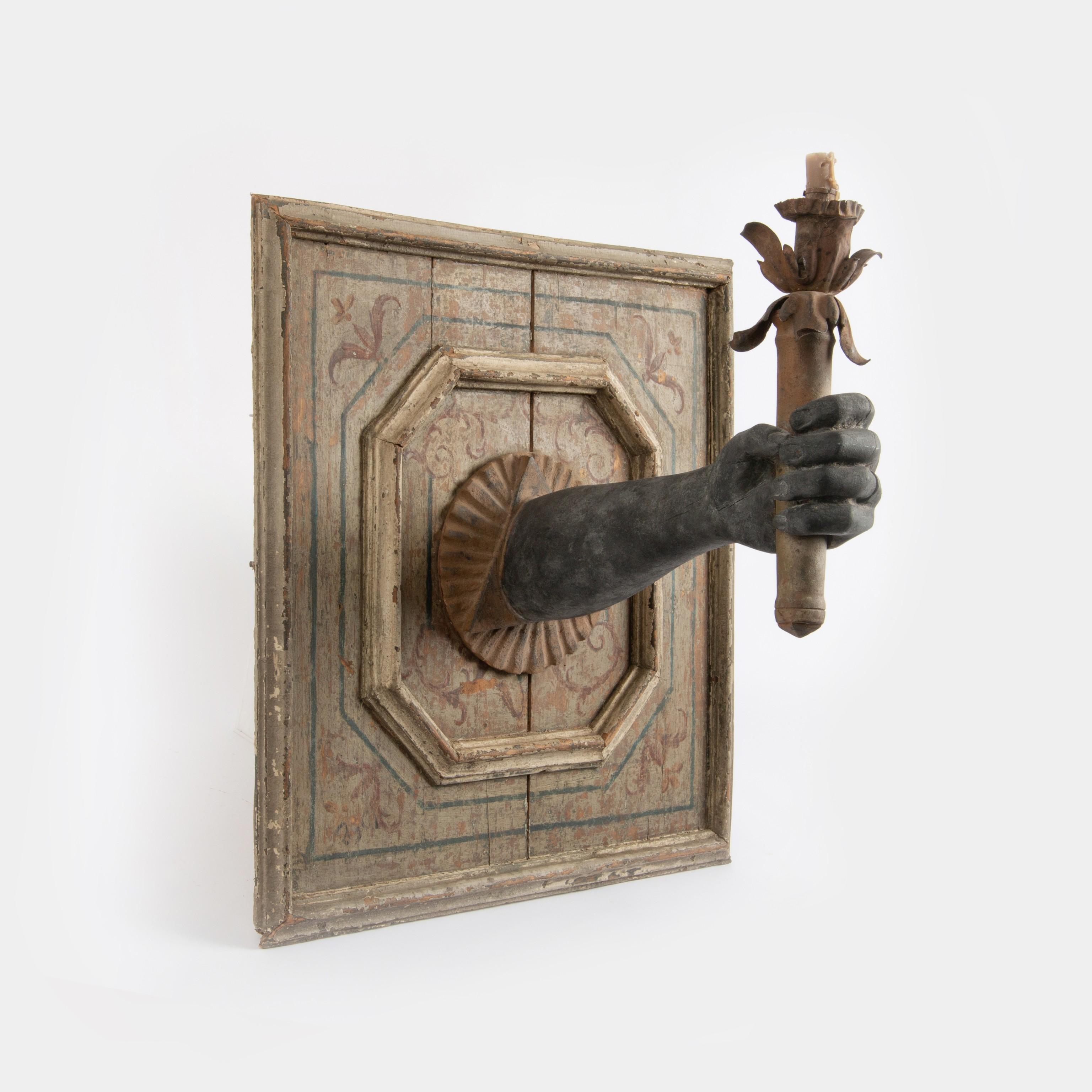 Appraisal: EARLY BLACKAMOOR WALL SCONCE WITH CARVED ARM AND TORCH An