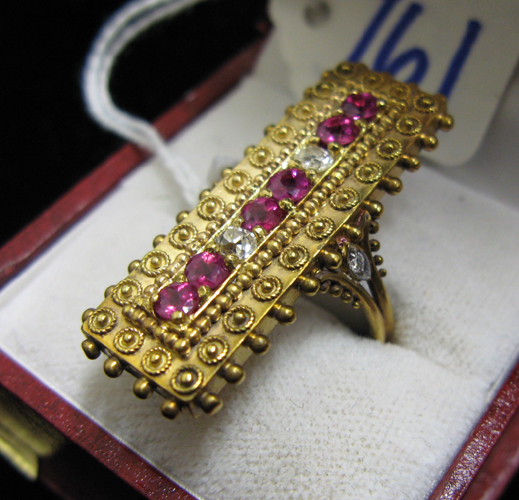 Appraisal: RUBY DIAMOND AND NINE KARAT GOLD RING set with six