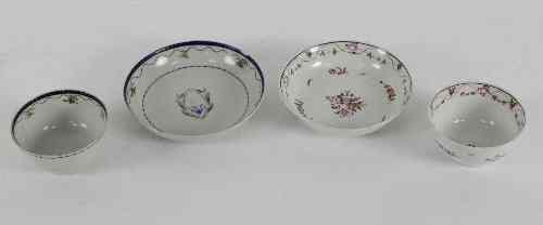 Appraisal: An English porcelain tea bowl and saucer painted floral sprays