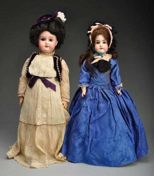 Appraisal: Lot of German Bisque Head Dolls Description Larger is a