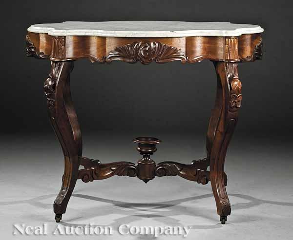 Appraisal: An American Rococo Carved Mahogany Center Table mid- th c