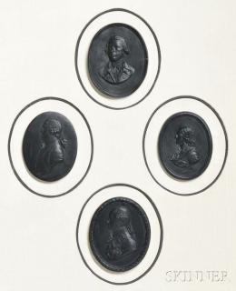 Appraisal: Four Framed Wedgwood Black Basalt Oval Portrait Plaques England th