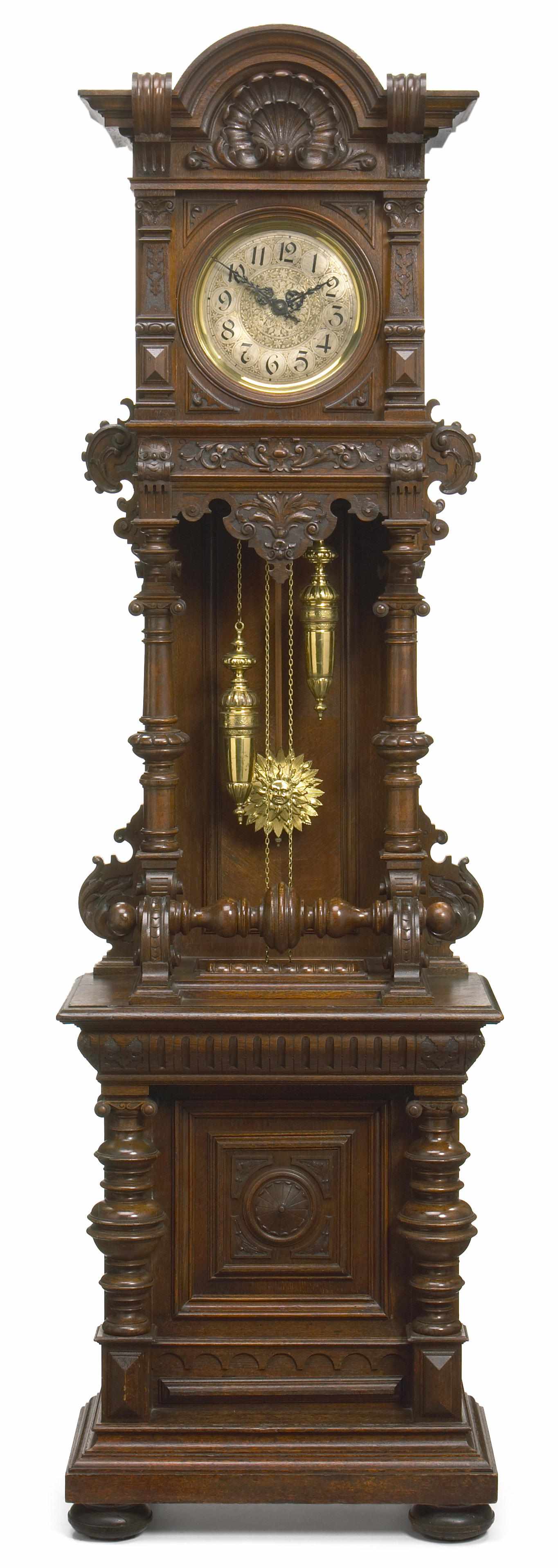 Appraisal: A Continental Renaissance Revival carved oak tall case clock late