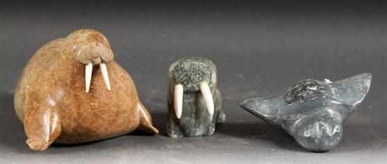 Appraisal: Two Inuit carved soapstone and ivory walruses together with a