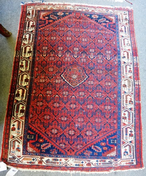 Appraisal: A Maslaghan rug Persian the indigo field with madder flowerheads