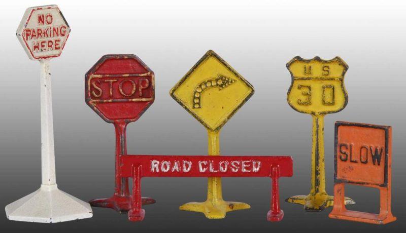 Appraisal: Lot of Cast Iron Arcade Road Toy Signs Description Includes