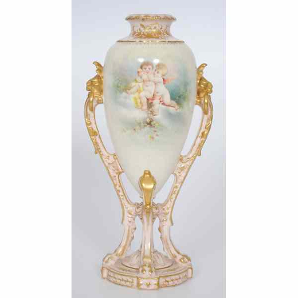 Appraisal: Royal Bonn Vase with Cherubs Hand-painted vase with a -footed