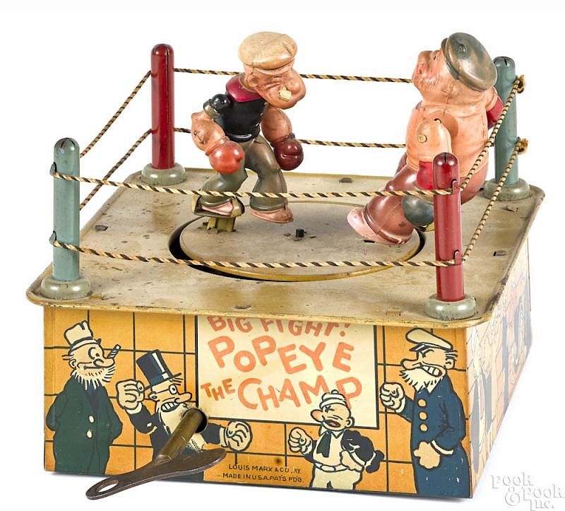 Appraisal: Marx tin lithograph wind-up Popeye The Champ Marx tin lithograph