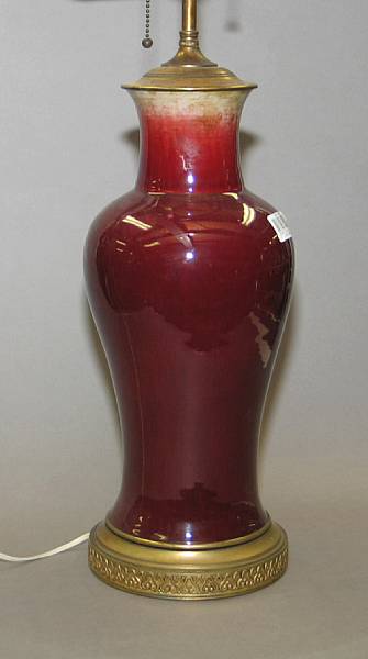 Appraisal: A flamb glazed porcelain vase th Century Now mounted as