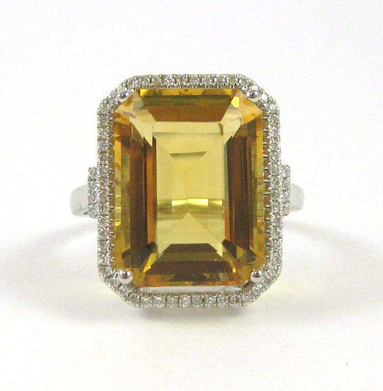 Appraisal: CITRINE DIAMOND AND FOURTEEN KARAT GOLD RING The white and