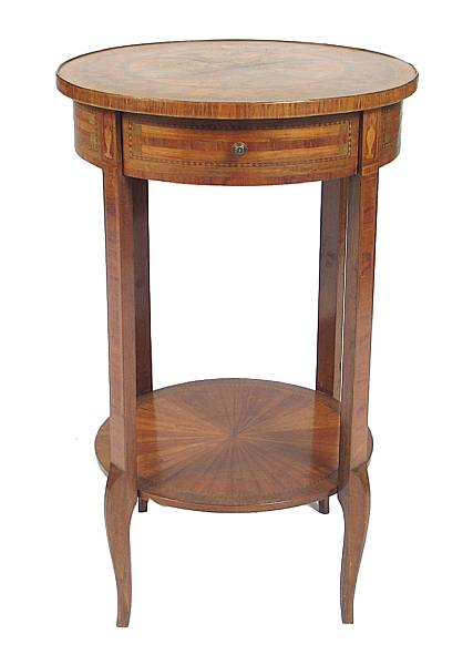 Appraisal: An Italian Neoclassical style two tiered occasional table height in