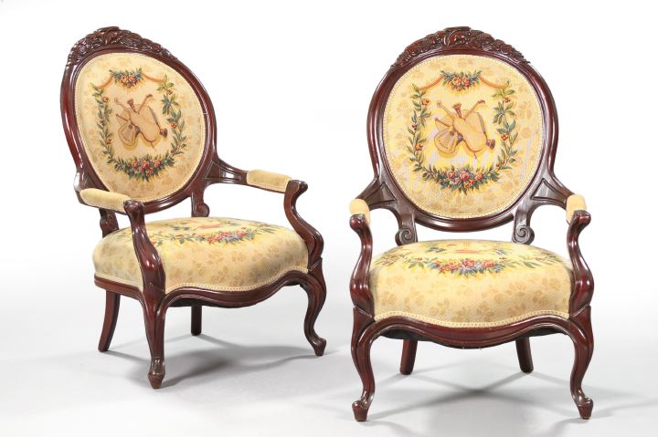 Appraisal: Pair of Rococo Revival-Style Mahogany Armchairs each with a medallion