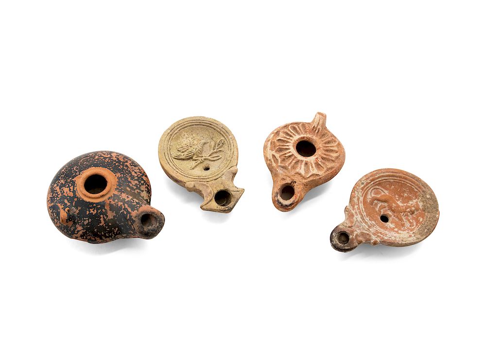 Appraisal: Four Ancient Terra Cotta Oil Lamps Four Ancient Terra Cotta