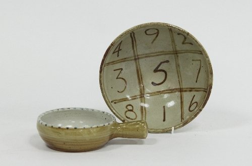 Appraisal: Wenford Bridge Pottery A bowl decorated numbers in a grid