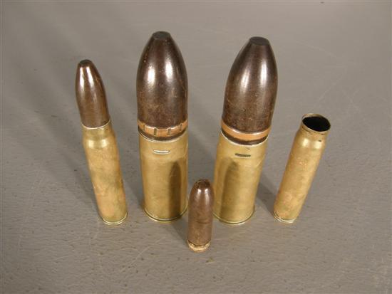 Appraisal: Four rounds of st World War Heavy Calibre ammunition deactivated