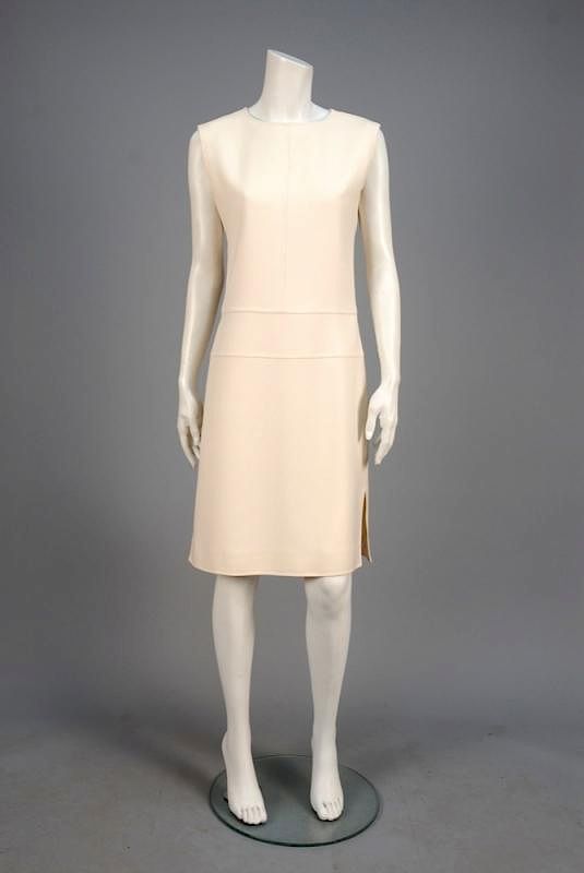 Appraisal: COURREGES WOOL DAY DRESS s Winter white with sleeveless bodice