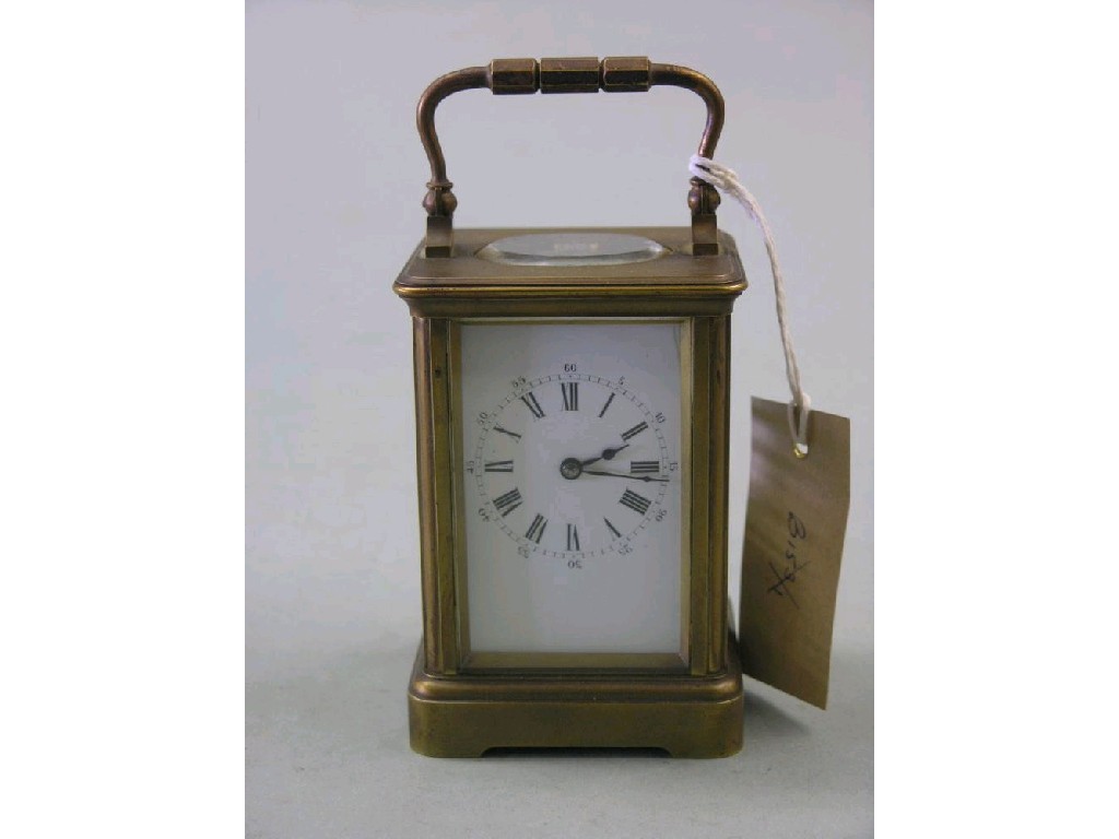 Appraisal: A brass carriage clock by Drocourt enamelled dial timepiece movement