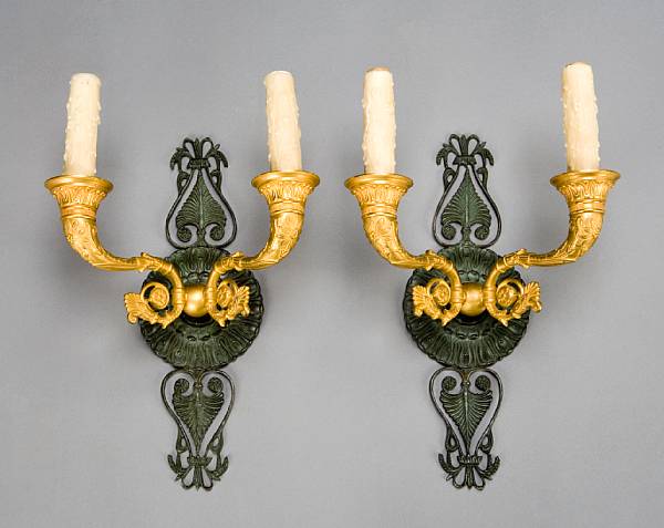 Appraisal: A pair of Empire style gilt and patinated bronze two