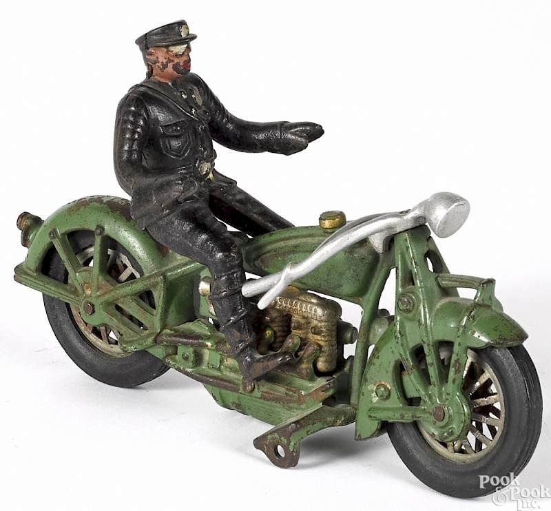 Appraisal: Hubley cast iron Indian policeman four cylinder mo Hubley cast