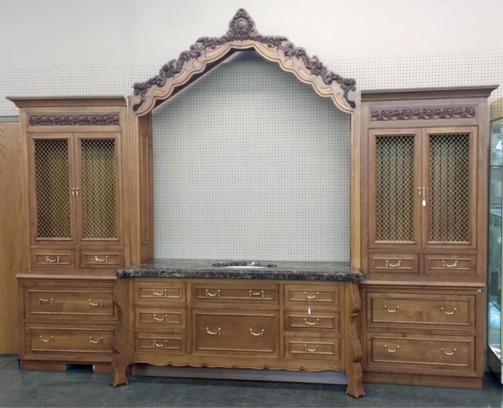 Appraisal: A French style vanity with side cabinets made by Acorn