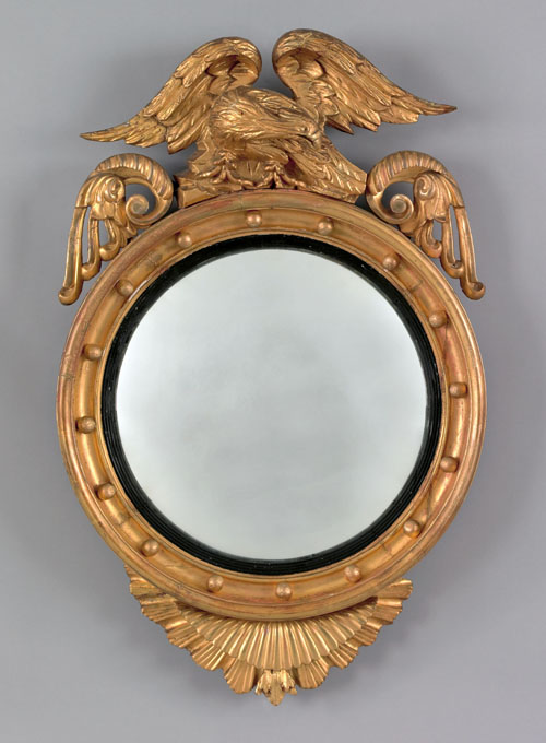 Appraisal: Giltwood convex mirror early th c with the label of