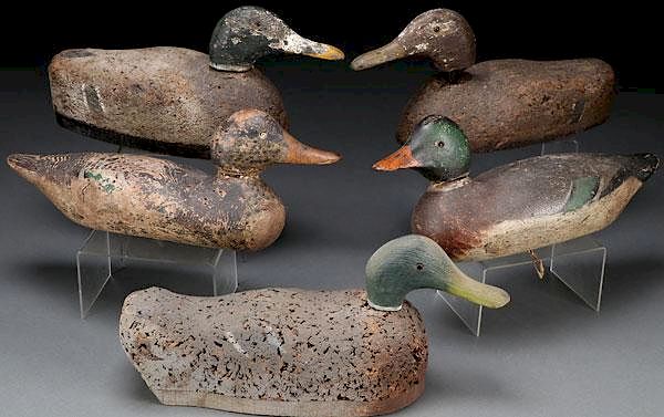 Appraisal: FIVE WOOD AND CORK PAINTED DUCK DECOYS FIVE WOOD AND