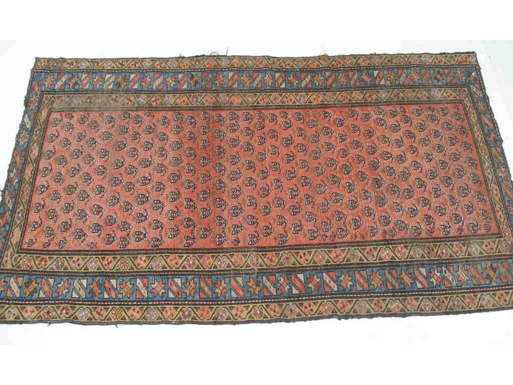 Appraisal: Antique Persian Rug full field of boteh decoration on rust