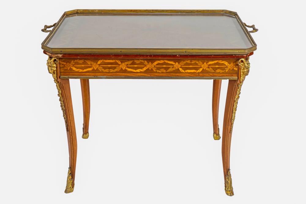 Appraisal: FRENCH MARQUETRY COFFEE TABLEwith detachable glass two-handled tray over a