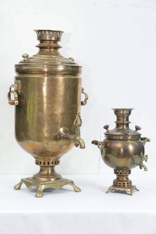 Appraisal: TWO SAMOVARS Brass with turned wooden handles and h