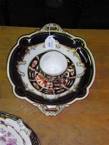 Appraisal: A ROYAL CROWN DERBY TWO HANDLED DISH painted to the