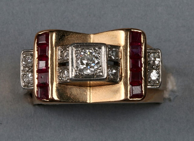 Appraisal: AN ART DECO STYLE RUBY AND DIAMOND SET DRESS RING