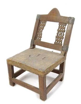 Appraisal: An Ashanti low chair with carved splats one missing with